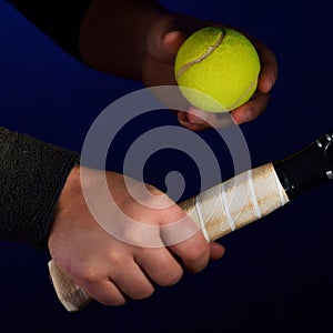 Tennis racket grip and ball