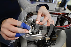 Tennis racket in the stringing machine photo