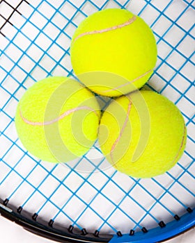 Tennis raquet with a tennis balls