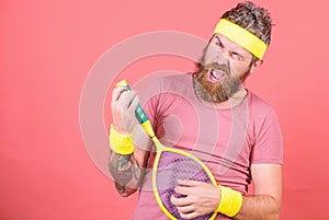 Tennis sport and entertainment. Man bearded hipster wear sport outfit. Having fun. Tennis active leisure. Athlete