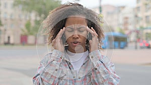 Tense African Woman with Headache Outdoor