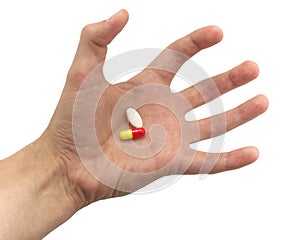 Tense hand with pills