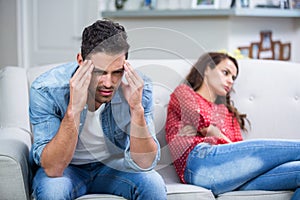 Tensed man after argument with woman