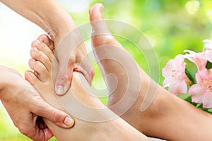 Tension relieving foot massage . photo