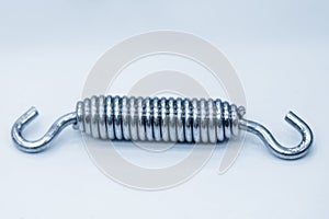 The tension wire coil spring in the light blue scene