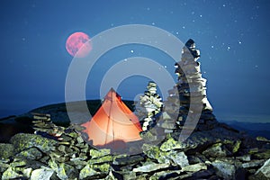 Tent alpine starry night and Red Moon