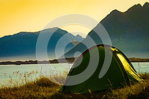 Tent on beach sea shore, Lofoten Norway