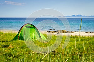 Tent on beach sea shore, Lofoten Norway
