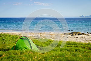 Tent on beach sea shore, Lofoten Norway