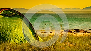 Tent on beach sea shore, Lofoten Norway