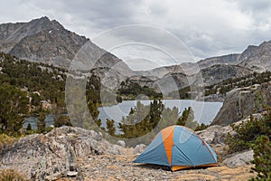 Tent in beautiful spot overlooking mountain lake