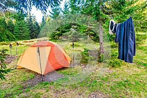 Tent camp with drying clothes