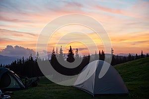 Tent on a camping site in the mountains