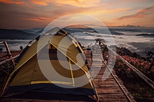 tent and camping at Tak with fog mountain and sun rise backgroung photo