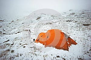 Tent camping in winter mountains