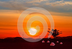 Tent canvas tourist accommodation camping relax time sunset on background with copy space