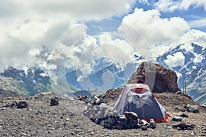 Tent climbers in the mountains. Against the backdrop of mountain peaks. alpinists camp