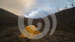 Tent and Clouds in Autumn Morning in Khibiny Mountains. Russia. Time Lapse