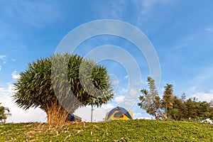 Tent on mountain in bule sky
