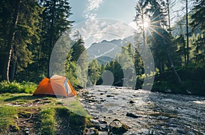 Tent Pitched Next to River photo
