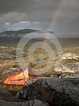 Tent and rainbow