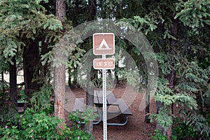 A tent site sign at a campground.