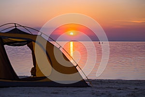 Tent on a sunset background