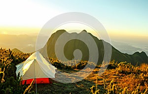 Tent on the top of a mountain with a nice view photo
