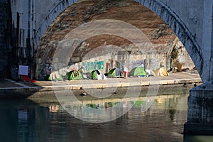 Tents near the cancal in Rome Italy showing the poverty of the city where the homeless people rest