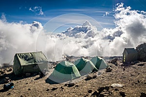 Tents over clouds for people trekking Mount Kilimanjaro