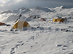 Tents under snow in the camp, Andes
