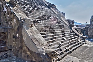 Steps of the Pyramid of the Feathered Serpent in Teotihuacan. Quetzalcoatl, deity of Mesoamerican culture photo