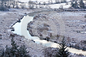 Tepla River in snowy winter landscape near Cihelny, Karlovy Vary