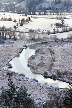 Tepla River in snowy winter landscape near Cihelny, Karlovy Vary