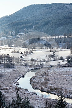 Tepla River in snowy winter landscape near Cihelny, Karlovy Vary