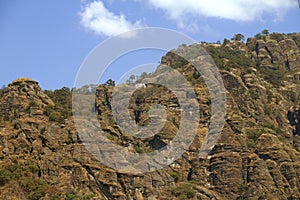 Mountains with aztec pyramid in tepoztlan near cuernavaca, morelos I photo