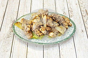 Teppanyaki chicken recipe with vegetables, bone, grilled chicken in small pieces