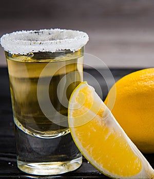 Tequila drink served in glasses with lime and salt