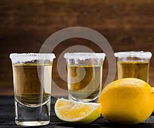 Tequila drink served in glasses with lime and salt