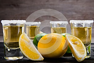 Tequila drink served in glasses with lime and salt