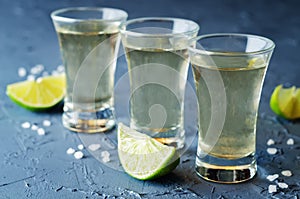 Tequila in glasses with lime and salt