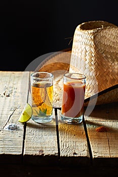 Tequila, sangrita and lemon photo