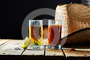 Tequila, sangrita and lemon photo