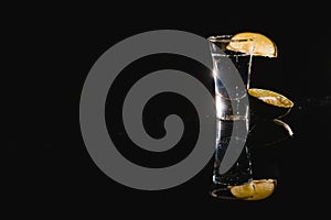 Tequila shot with lime . Selective focus