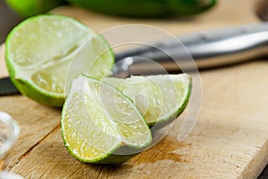 Tequila Shots With Close Up Lime Wedges Cut Up For Drinking At A