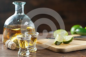 Tequila Shots With Lime Wedges Cut Up For Drinking At A Party. C