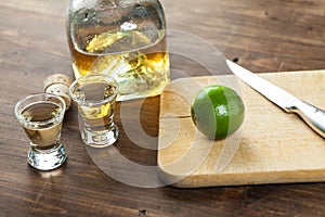 Tequila Shots With Lime Wedges Cut Up For Drinking At A Party. C