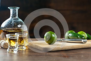 Tequila Shots With Lime Wedges Cut Up For Drinking At A Party. C