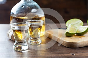 Tequila Shots With Lime Wedges Cut Up For Drinking At A Party. C