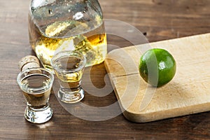 Tequila Shots With Lime Wedges Cut Up For Drinking At A Party. C